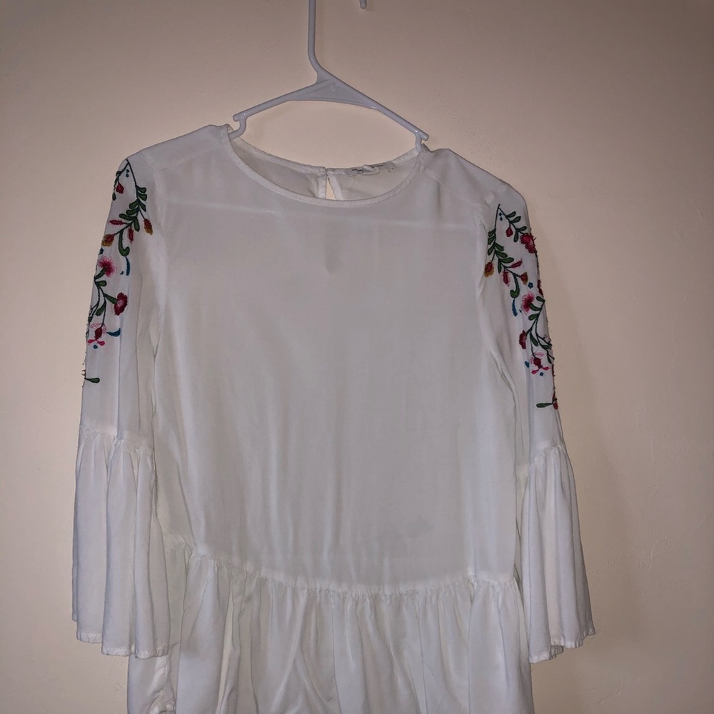 White blouse top with embroidered sleeves